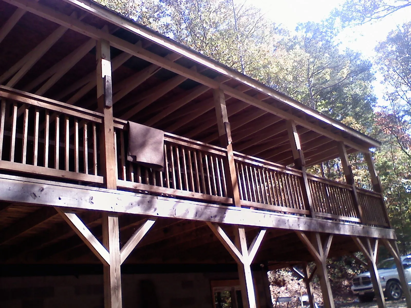 Timber framing under a new elevated porch and deck — Roof Leak Repair in Junction by Roofing Brothers